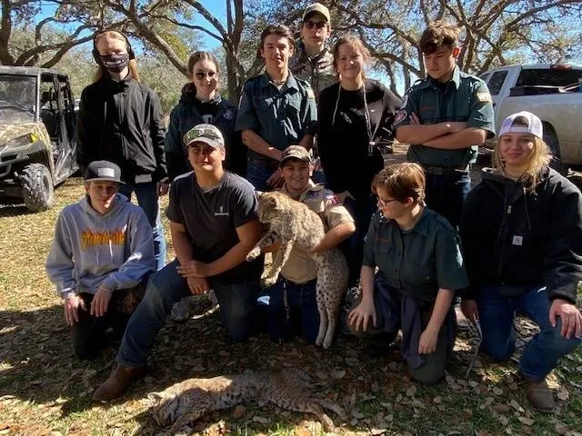 A group of people posing for a picture.