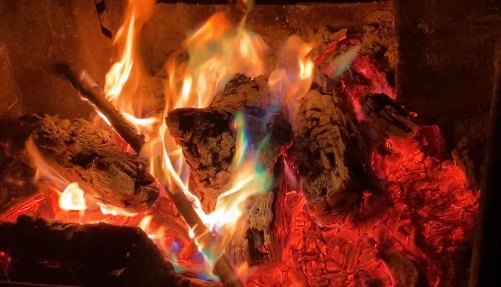 A fire with red and orange flames burning.