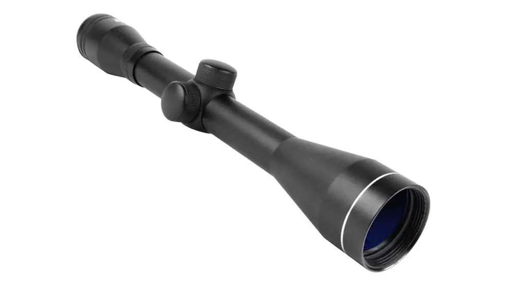 A black rifle scope with blue lens and a white dot.