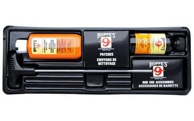 A black plastic case with some orange and yellow labels