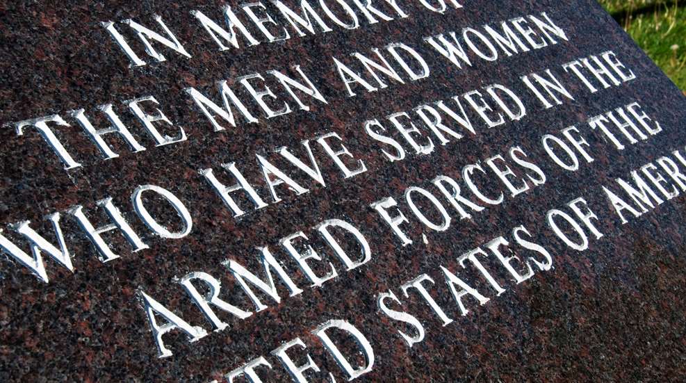 A close up of the words on a memorial