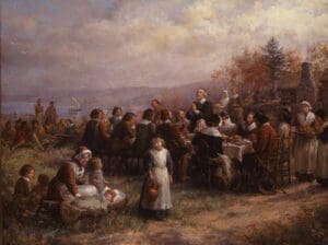 A painting of people gathered around a table.