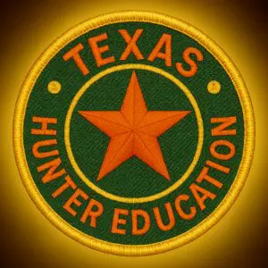 Hunter education class in outdoor setting.