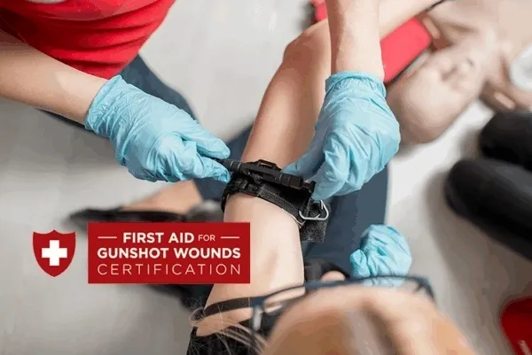 Applying tourniquet during first aid training.